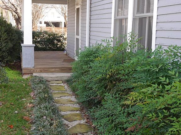 Bluestone walking path leading to your front door (from off-street parking pad).