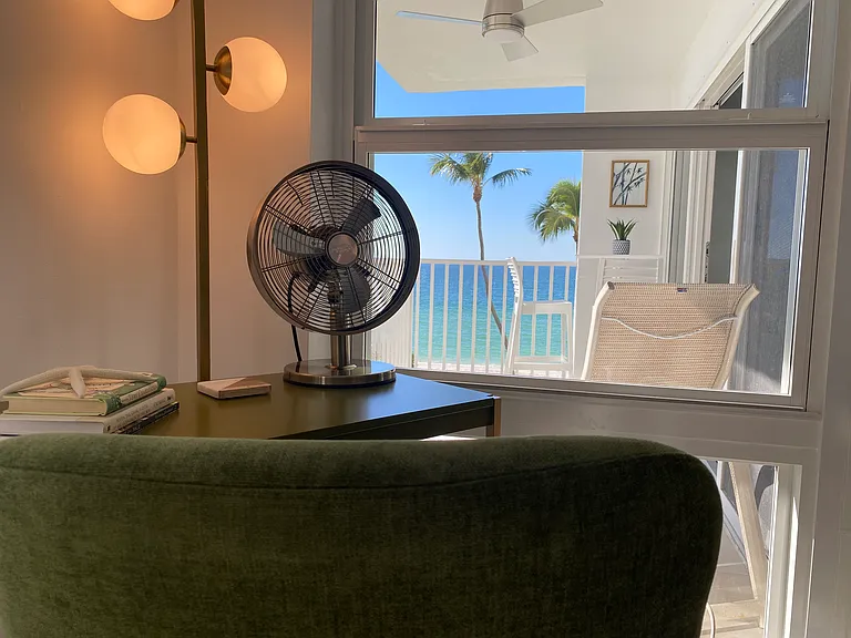 Desk workspace in master bedroom, ocean view.