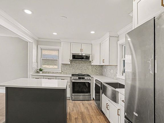 4th image of 6044 Washington St