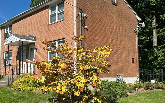 Home features lovingly-cared for landscaping.