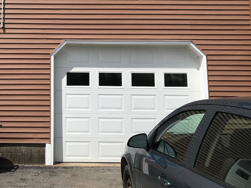 Automatic door opener included. Garage accessible directly from inside house.
