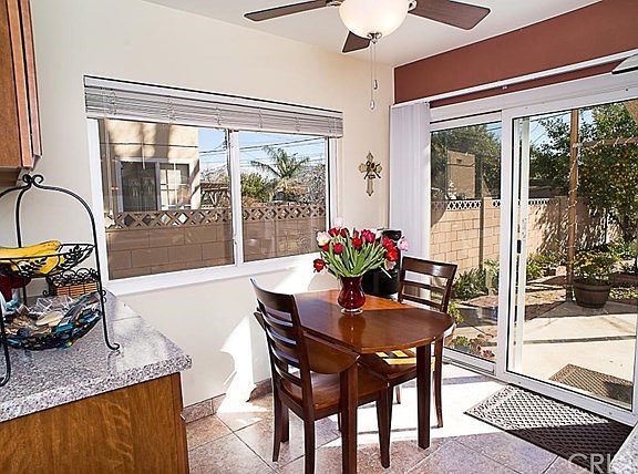 The kitchen breakfast nook with buffet storage.