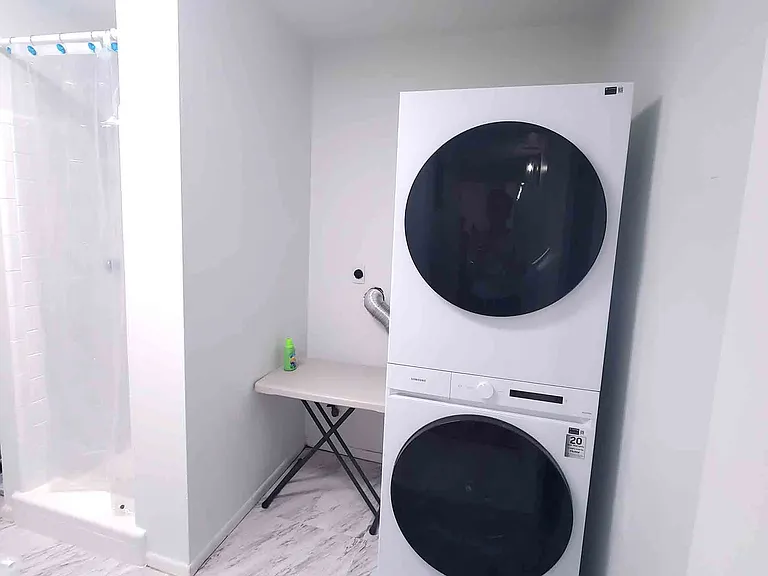 Laundry Room with Brand new Samsung smart Washer/Drier Combo, Shower and the storage. Back Door Private Entrance