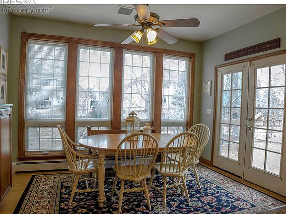 Eat-in kitchen leads to covered patio