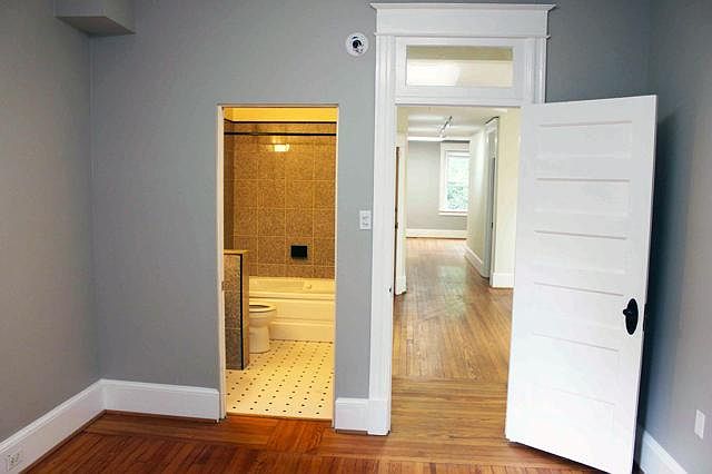 Second Bedroom with full bath. Looking through dining room towards living room