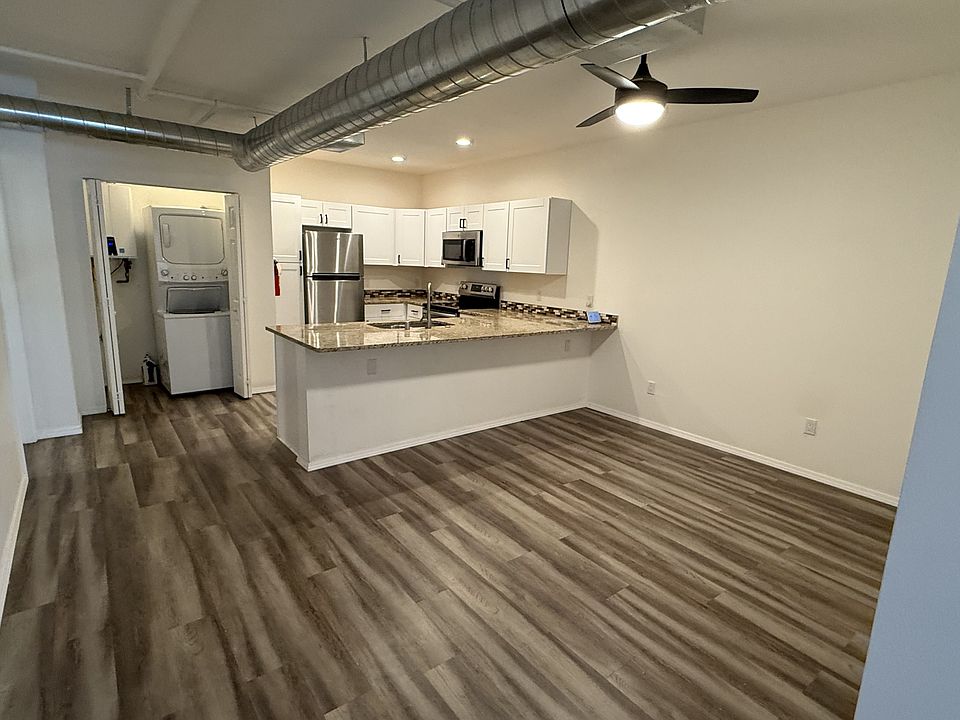 Looking into the dining room and kitchen