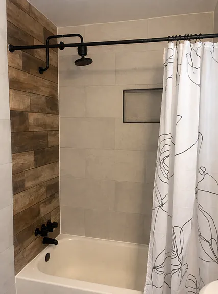 Primary bath shower over tub