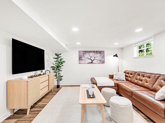+65" TV set
+Canned lighting
+L Sofa