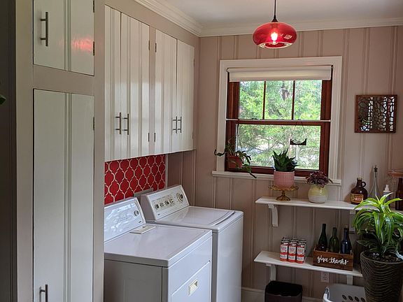 Laundry room. Washer and dryer included. Lots of storage.