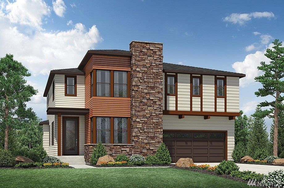 The AMES features 4 bdr, 3 ba; expansive great rm opens to dining rm & kitchen featuring oversized center island w/breakfast bar & large walk-in pantry; desirable main floor bedroom & full bath; luxurious master suite with 2 walk-in closets & elegant bath; spacious loft. 