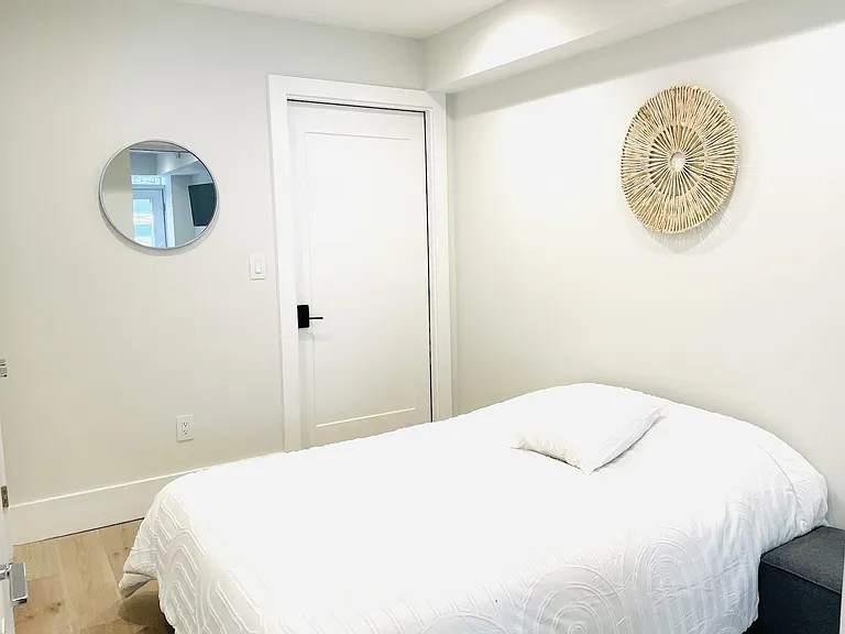 Full size bed with storage underneath.