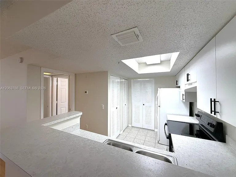 5045 Wiles Rd #201 — Photo 10
