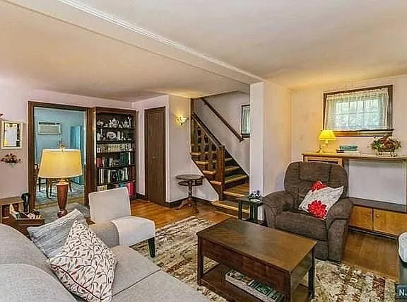 Living. Dining in distance. Stairs to 2nd floor. - 57 Jean St