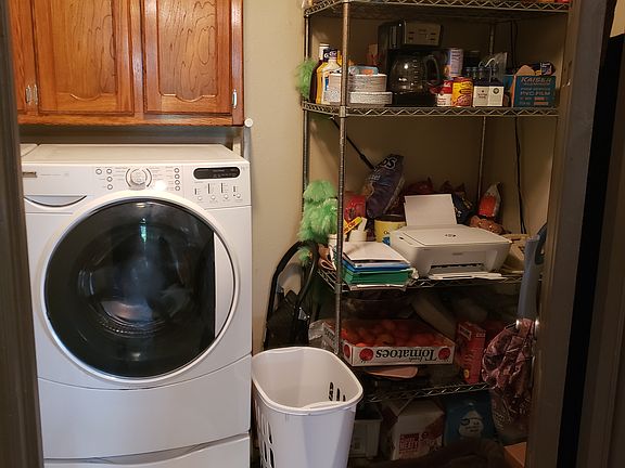 Extra storage in wash room.