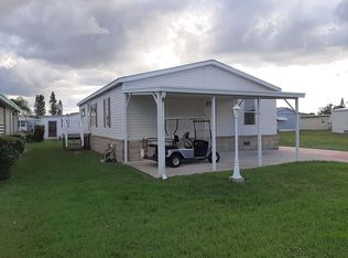 907 Pecan Cir, Barefoot Bay, FL 32976