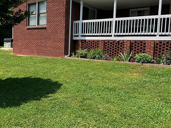 Large yard with landscaping 