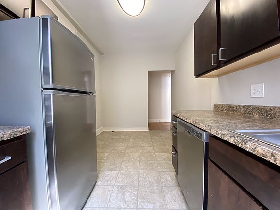 Beautiful kitchen with stainless steel appliances and dishwasher