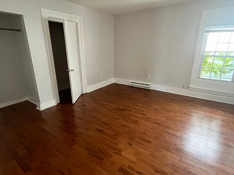 Hallway to bedrooms and kitchen