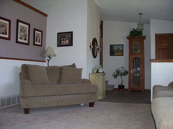 Beautiful livingroom w/ inviting entry.