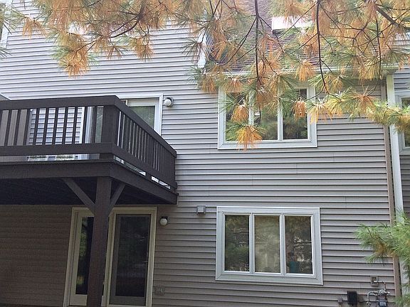Back of condo with deck