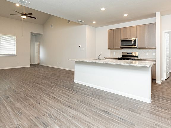 Dining Area to Kitchen and Family Room