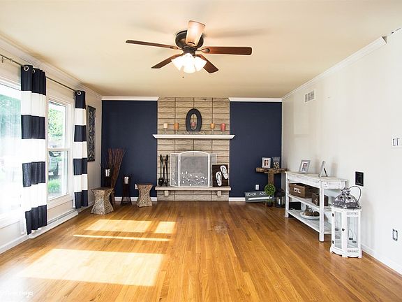 LIVING ROOM WITH A FIREPLACE
