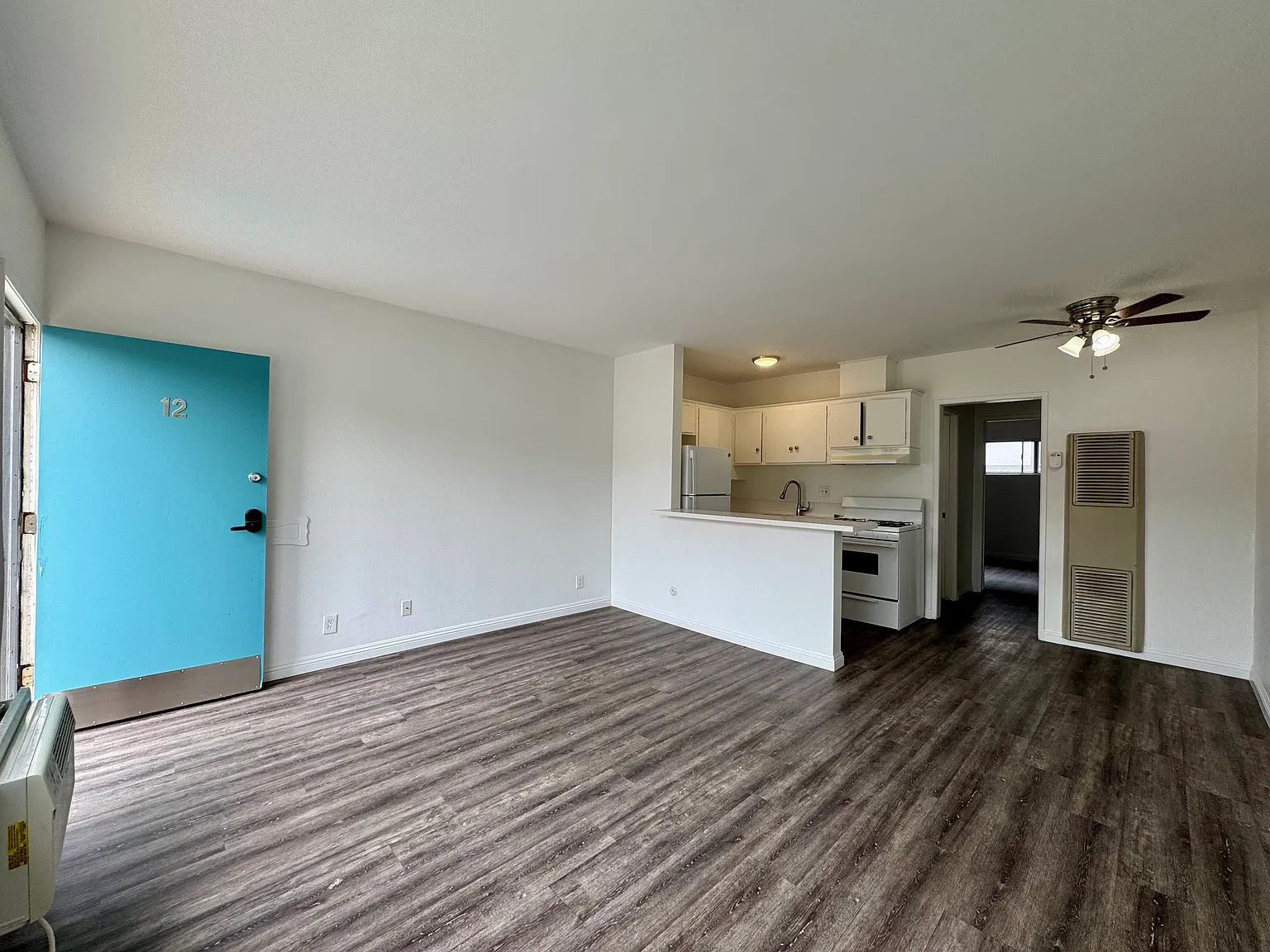 All photos are actual photographs of a comparable unit with a similar floor plan and finish style, shown for reference only.