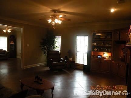 Living room with great spacious built-ins.