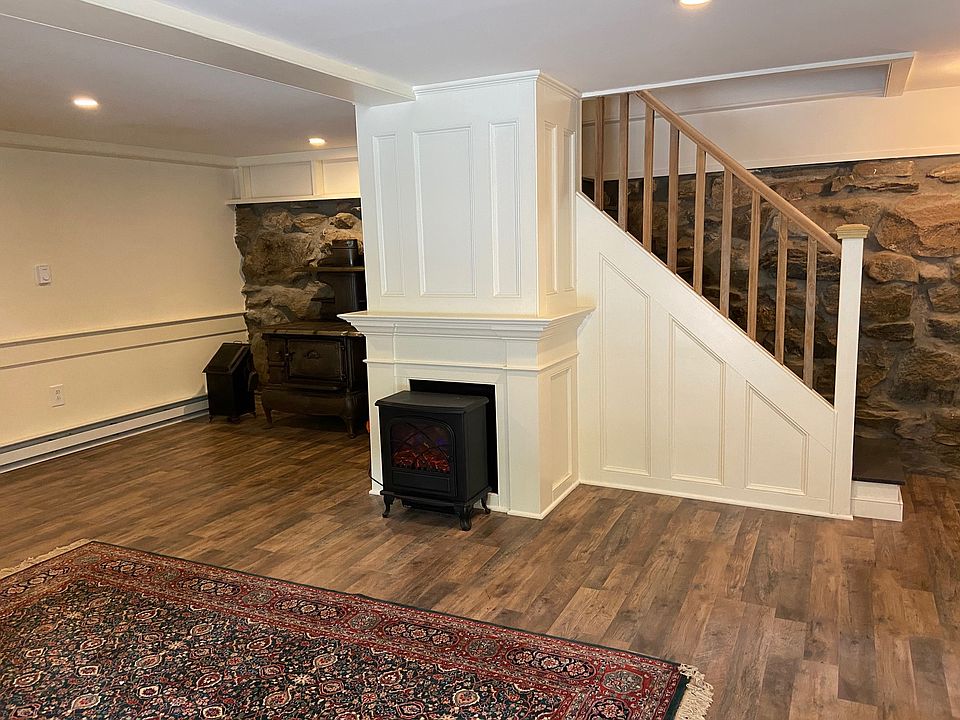 You enter the apartment at ground level. Staircase leads to second floor living room & kitchen