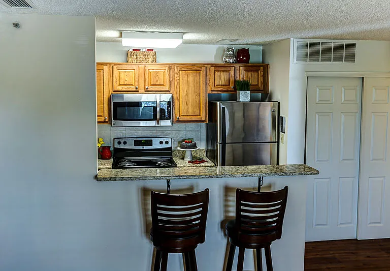 Convenient Bar Opens into Kitchen