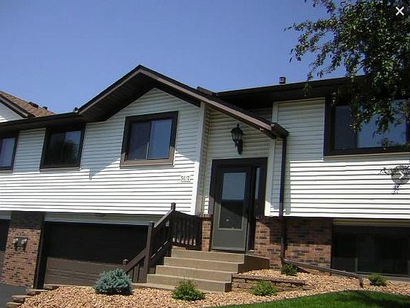 Front entrance and 2 car private garage