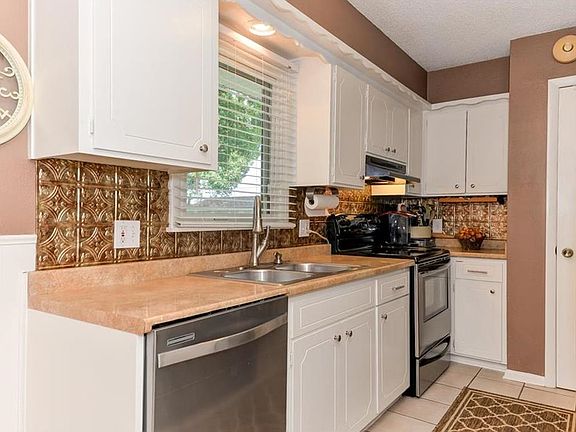Galley Kitchen with new Dishwasher.