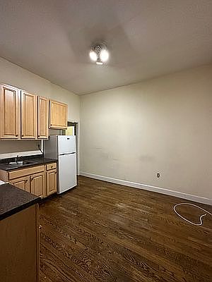 2nd image of 208 E 7th St APT 1