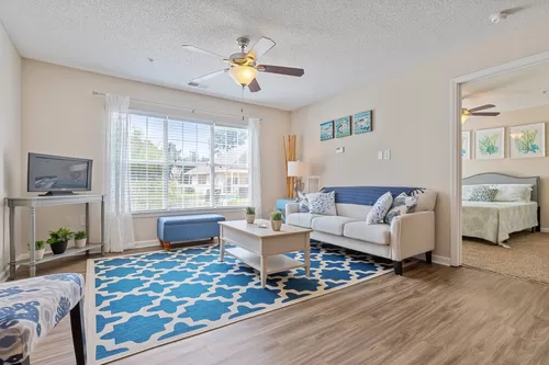 Spacious Living Room with Ceiling Fan - Cherry Grove Commons Apartments