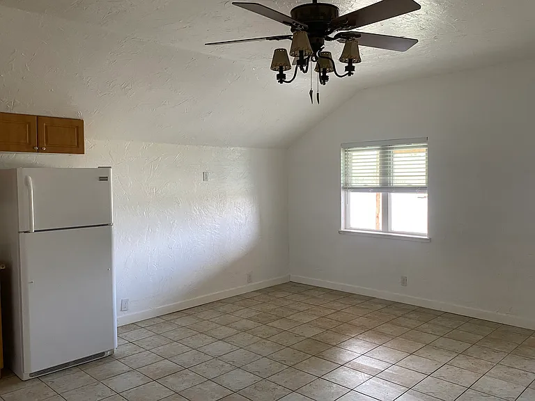 The open concept kitchen-living area is excellent for a family with kids or for entertaining. It's an ideal space for cooking, relaxing and socializing to happen together without walls separating the activities.