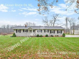 670 Grand River Dr NE, Ada, MI 49301