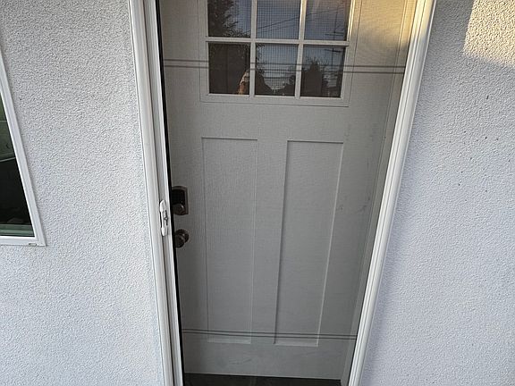 Front door with retractable screen