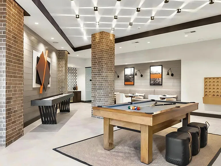 Game Room Featuring Pool Table, Shuffleboard & Lounge Seating