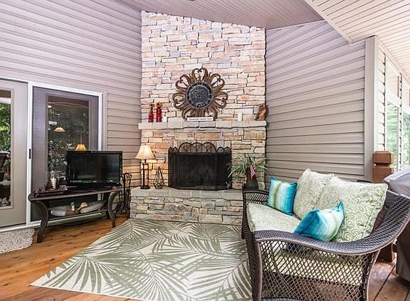 Wood Burning Stone Fireplace in Outside Living Area