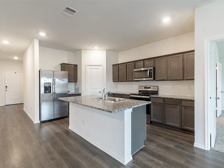 The refrigerator is included in this lease, with a nice pantry and stainless steel appliances.