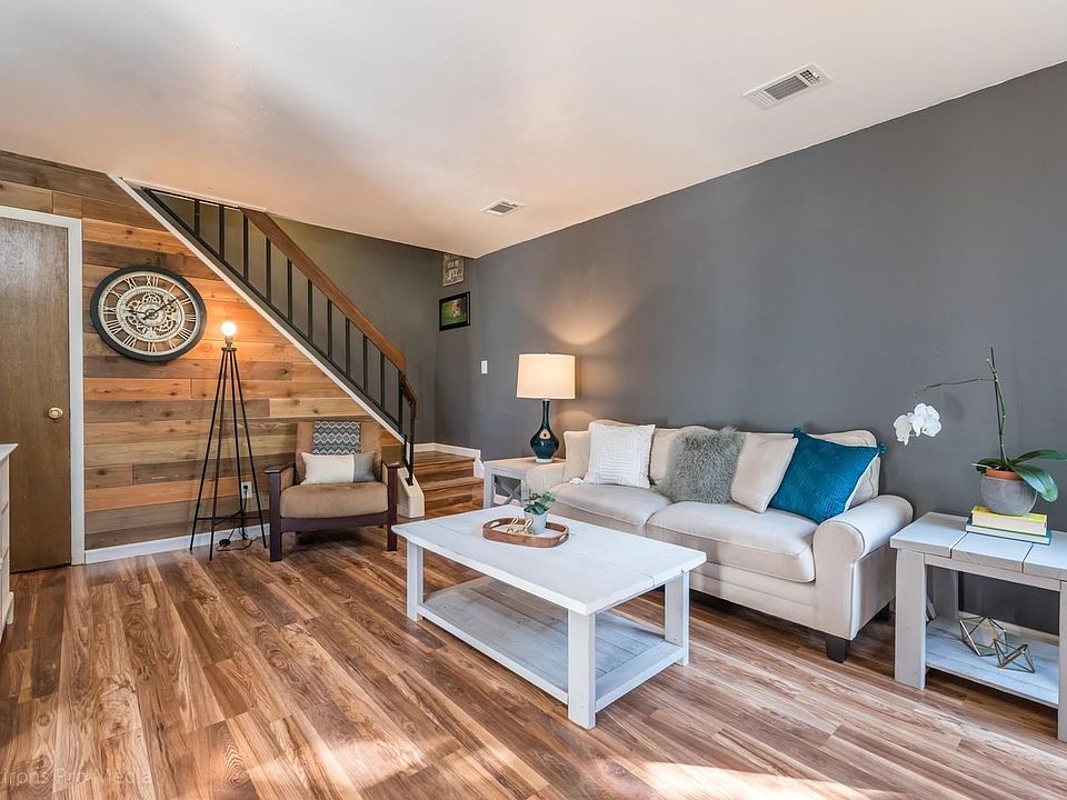 Updated and Open Living Room with Gorgeous Reclaimed Wood Accent Wall