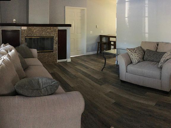 Living room with gas fireplace.