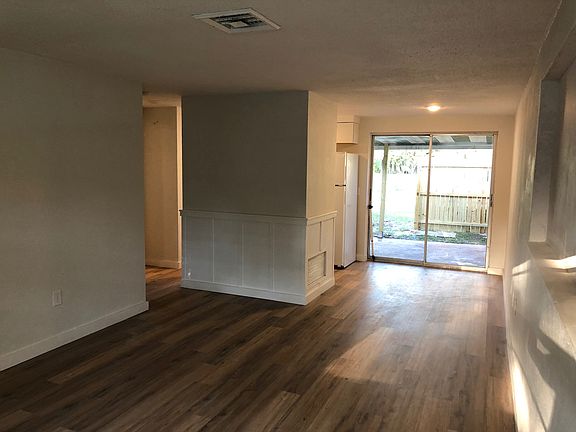 Living room flows through to private back patio