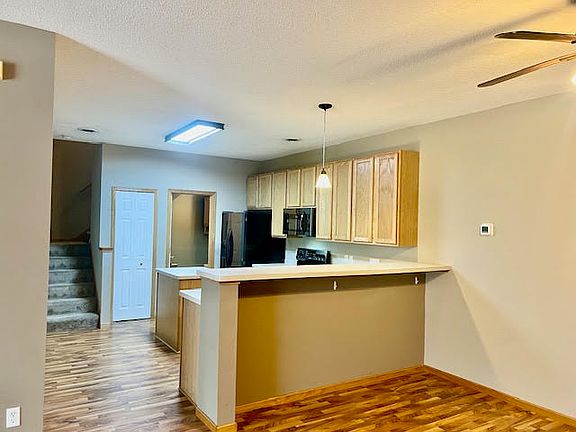 Another view of kitchen with sit up counter