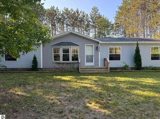 5609 Pine Aire Dr, Grawn, MI 49637