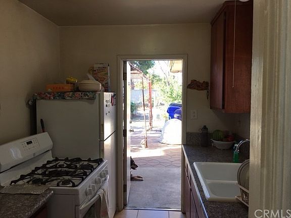 Kitchen view leading to backyard.