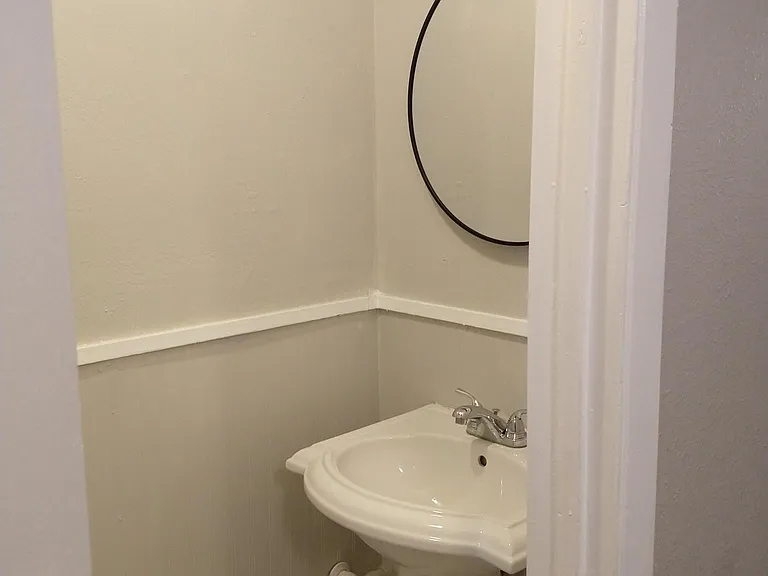 Downstairs bathroom has new tile and paint