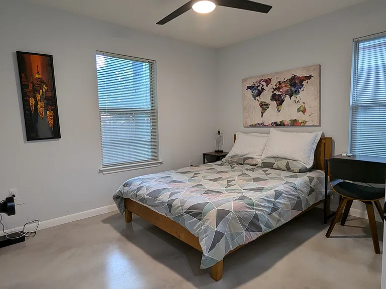 Guest bedroom which also is good sized to fit the bed and the office desk comfortably