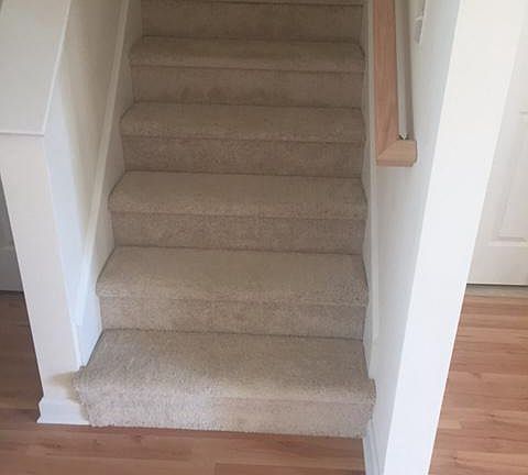 hardwood first floor and carpet upstairs