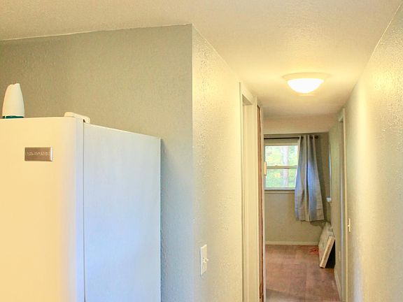 Hall to bath,bonus office/storage space and large back bedroom (open) with attached bath.